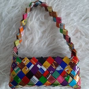 Mini purse made from gum wrappers.